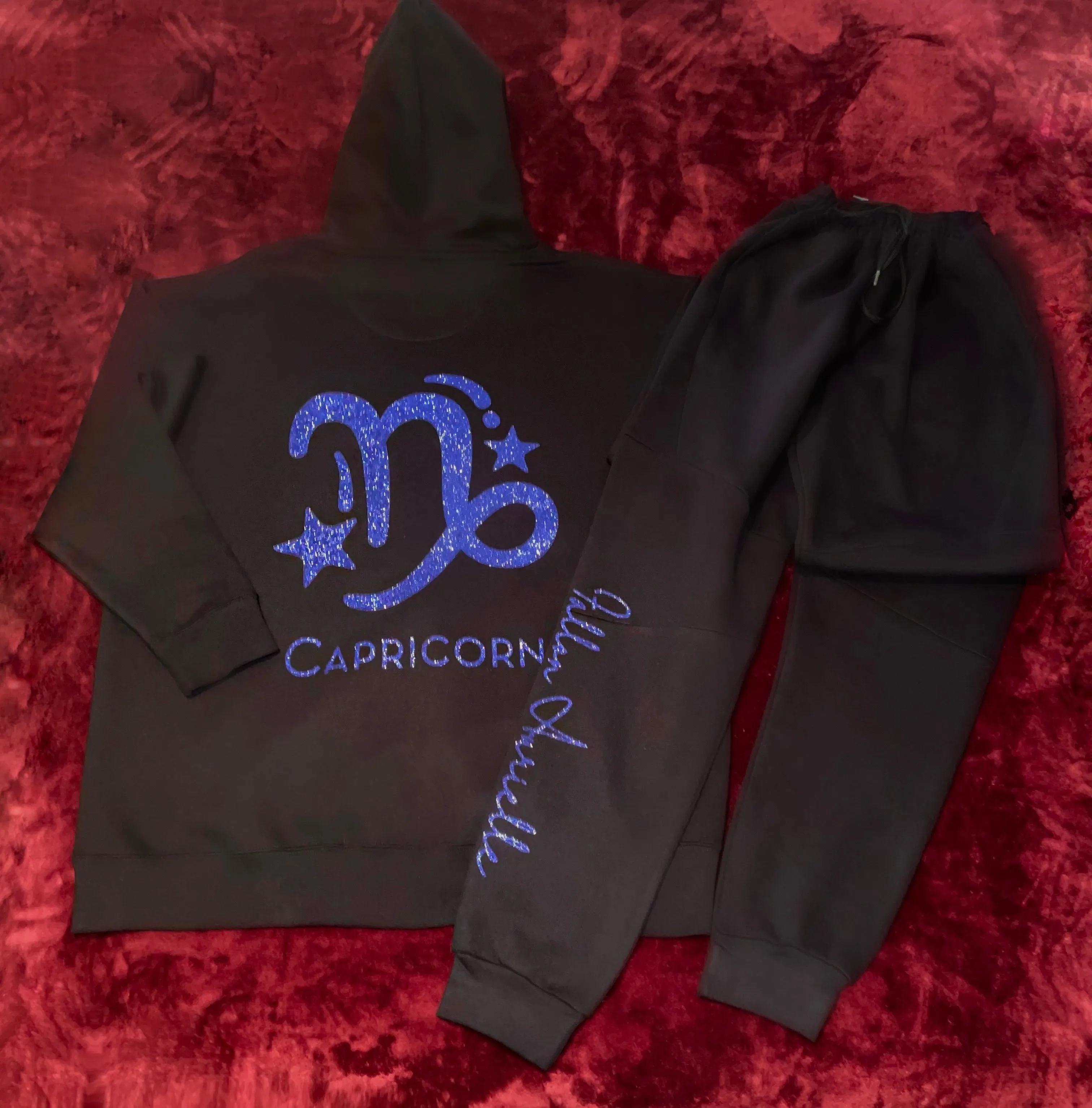 Fallon Aurielle Unisex Signature Capricorn Logo & Name Zodiac Hoodie (Black & Purple Sparkle)